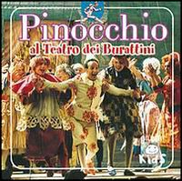 Pinocchio al teatro dei burattini. Pinocchio al teatro dei burattini.